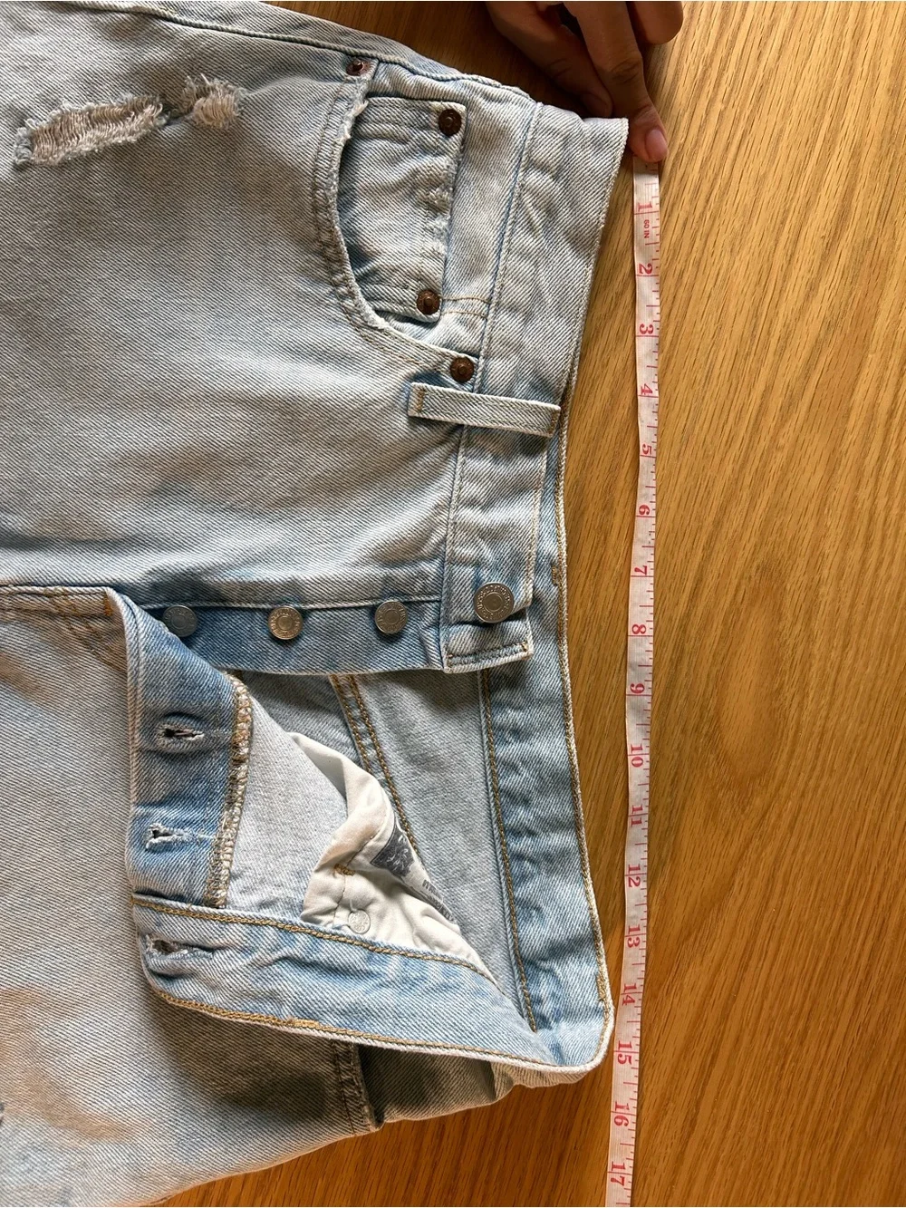 Levi's distressed light wash long denim button fly jean shorts size 28
